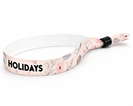 Braccialetti in tessuto per eventi con fiori in tonalità rosa